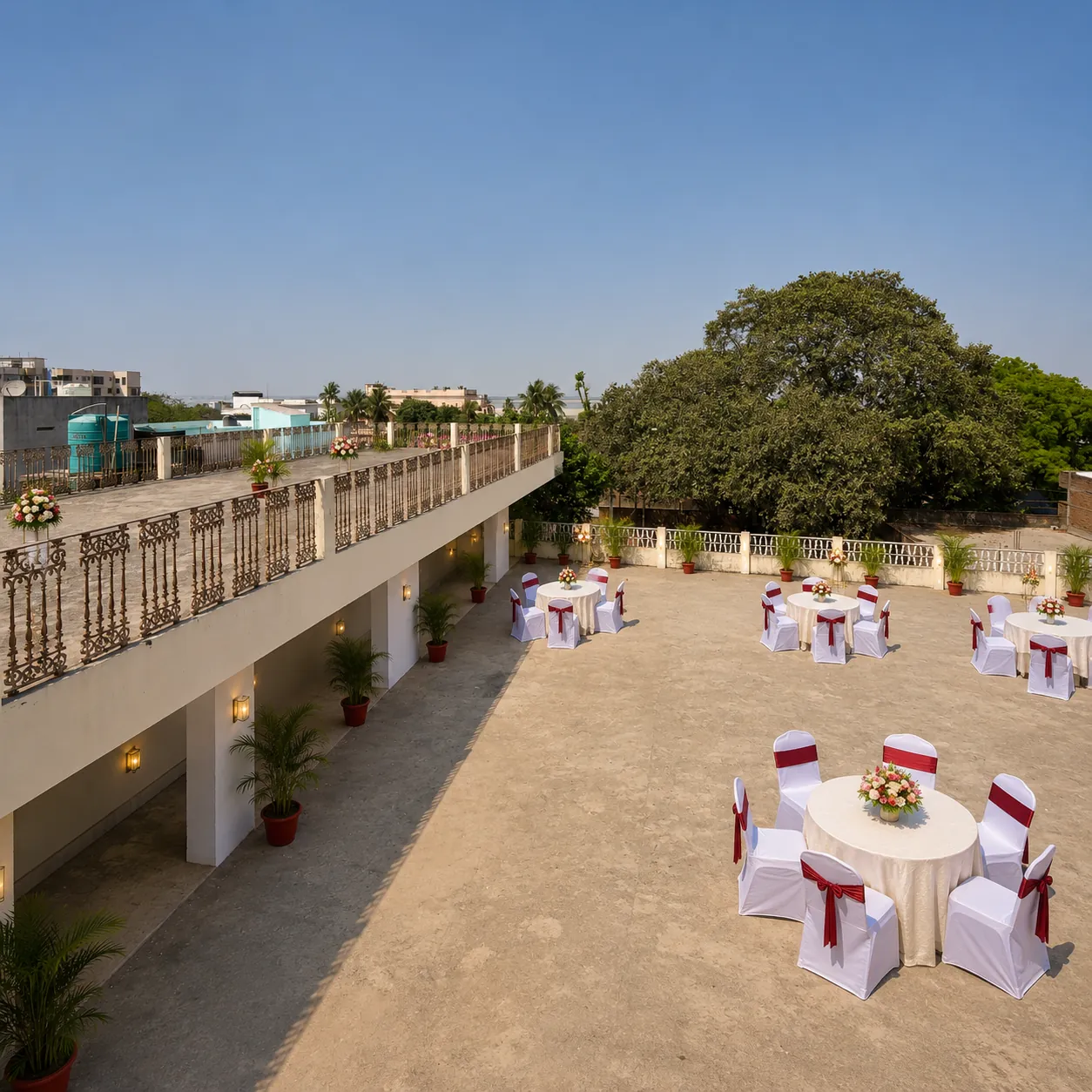 The rooftop by day, arranged with guest tables